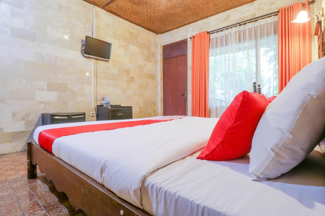 Oyo 1930 Ananda Beach Hotel Санур Экстерьер фото