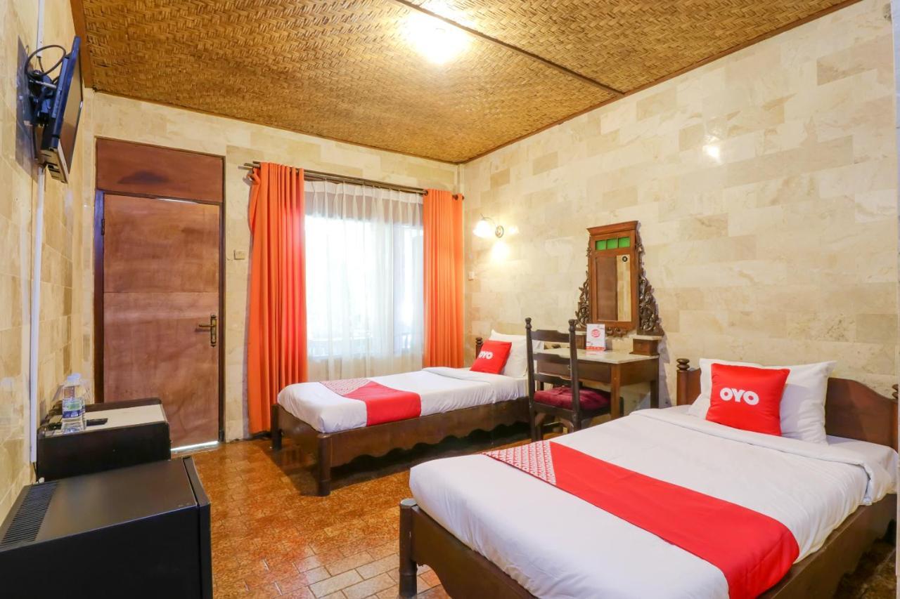 Oyo 1930 Ananda Beach Hotel Санур Экстерьер фото