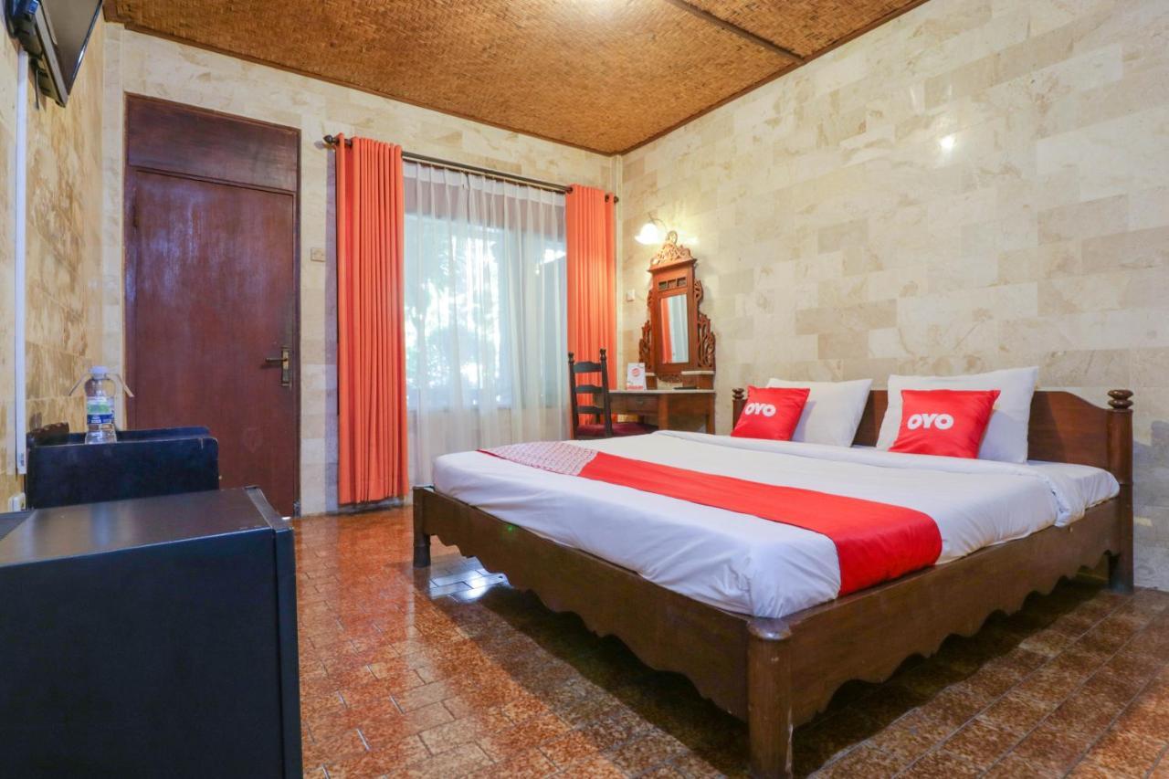 Oyo 1930 Ananda Beach Hotel Санур Экстерьер фото