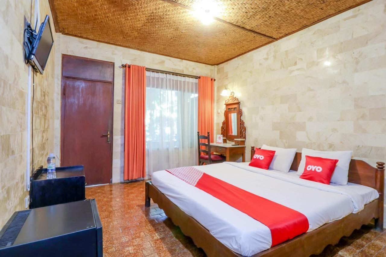 Oyo 1930 Ananda Beach Hotel Санур Экстерьер фото