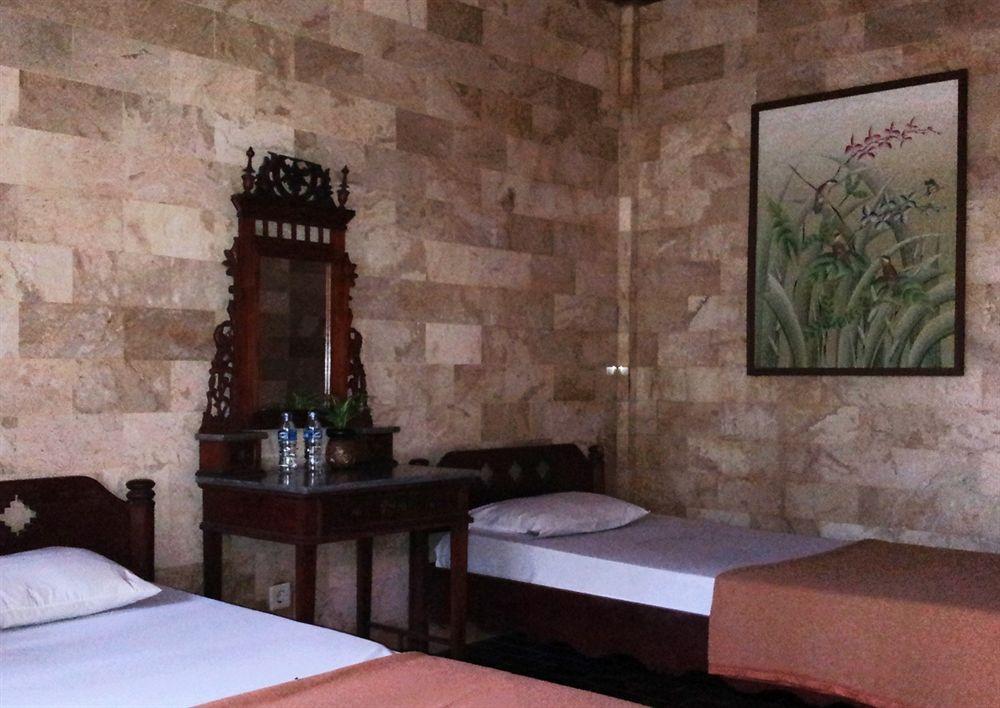 Oyo 1930 Ananda Beach Hotel Санур Экстерьер фото